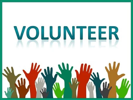Volunteer: handen in de lucht om aan te bieden vrijwillig te helepn